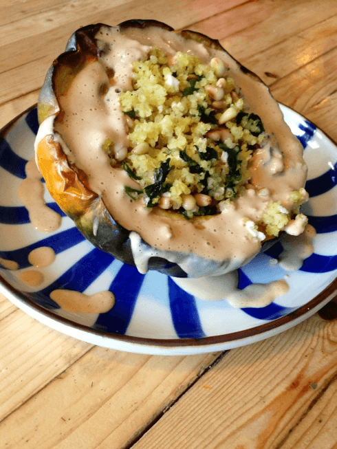 acorn squash stuffed with greek millet and lemon tahini dressing vegan gluten free best recipe